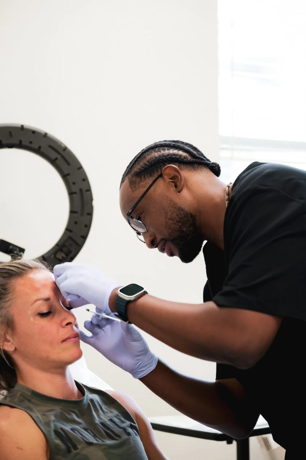 Provider performing a facial neurotoxin treatment at Fountain of Youth